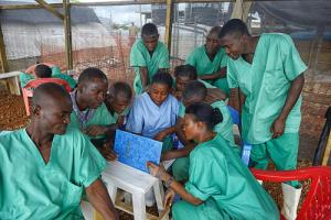 06-02-2015Ebola_Workers_0.jpg