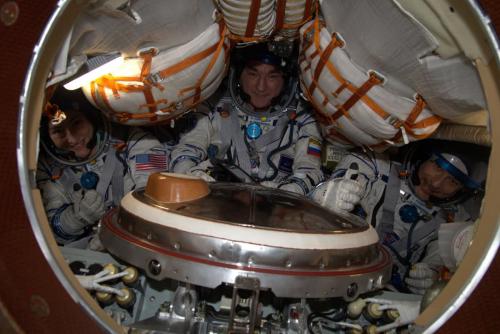 Luca_Christina_and_Alexander_in_Soyuz_MS-13_pillars_0.jpg